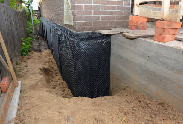 Happy homeowners after waterproofing job in Kettlersville